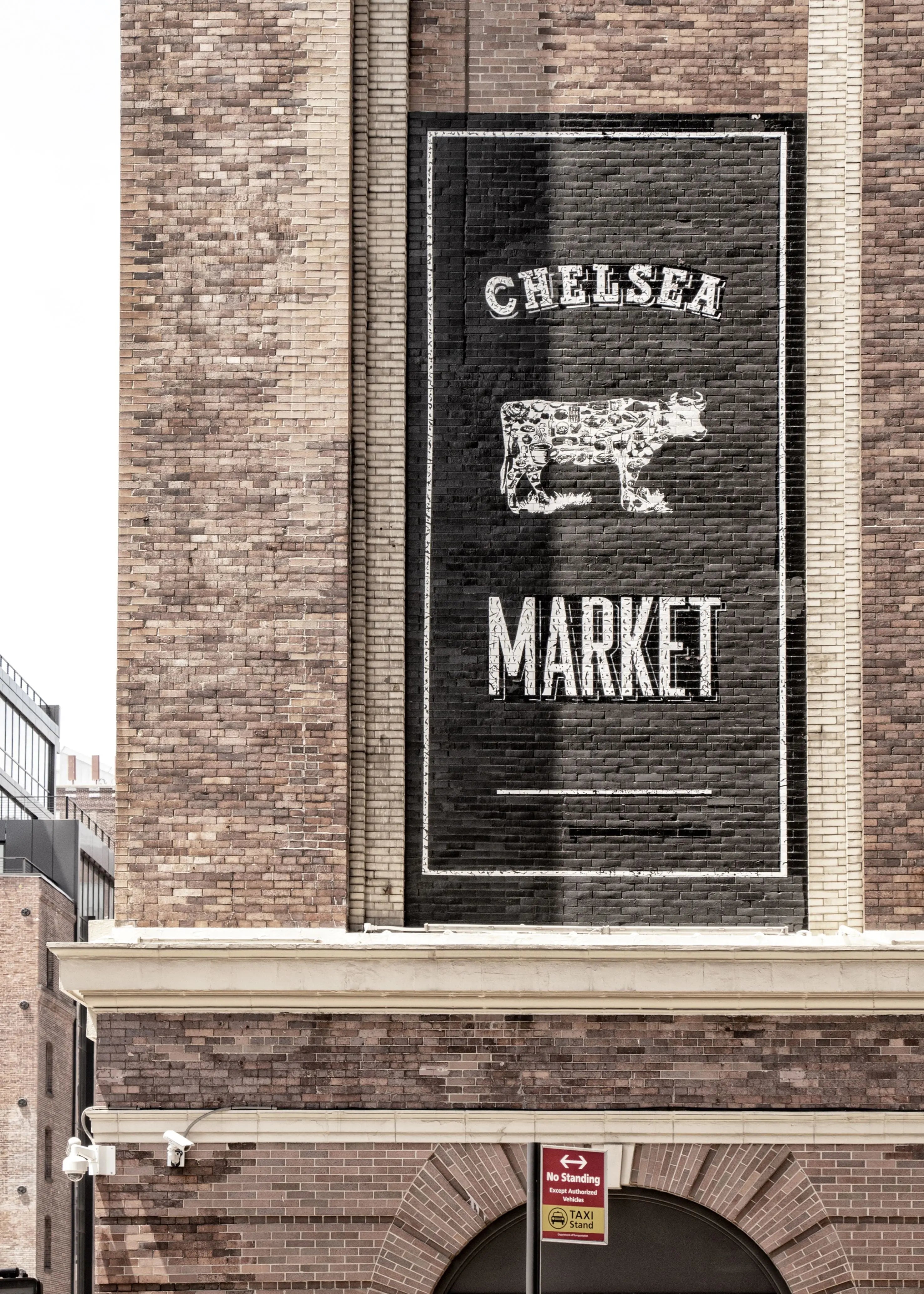 Schwarz-weiß Poster des Chelsea Market in New York, 21x29,7 cm, von Cosman-Photocollection, mit weißem Rand.