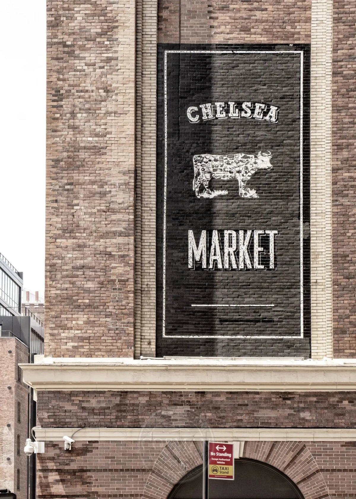 Schwarz-weiß Poster des Chelsea Market in New York, 21x29,7 cm, von Cosman-Photocollection, mit weißem Rand.