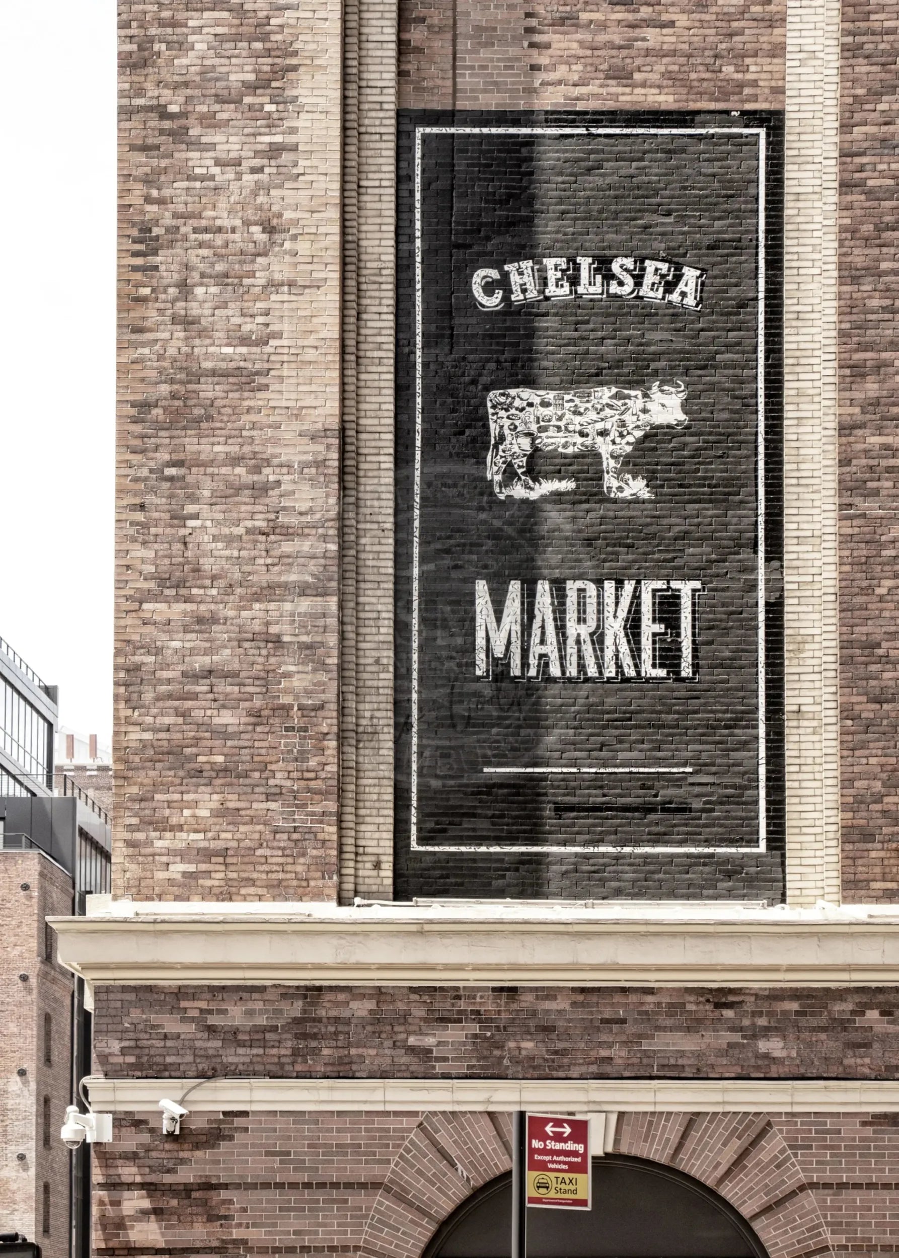 Schwarz-weiß Poster des Chelsea Market in New York, 21x29,7 cm, von Cosman-Photocollection, mit weißem Rand.