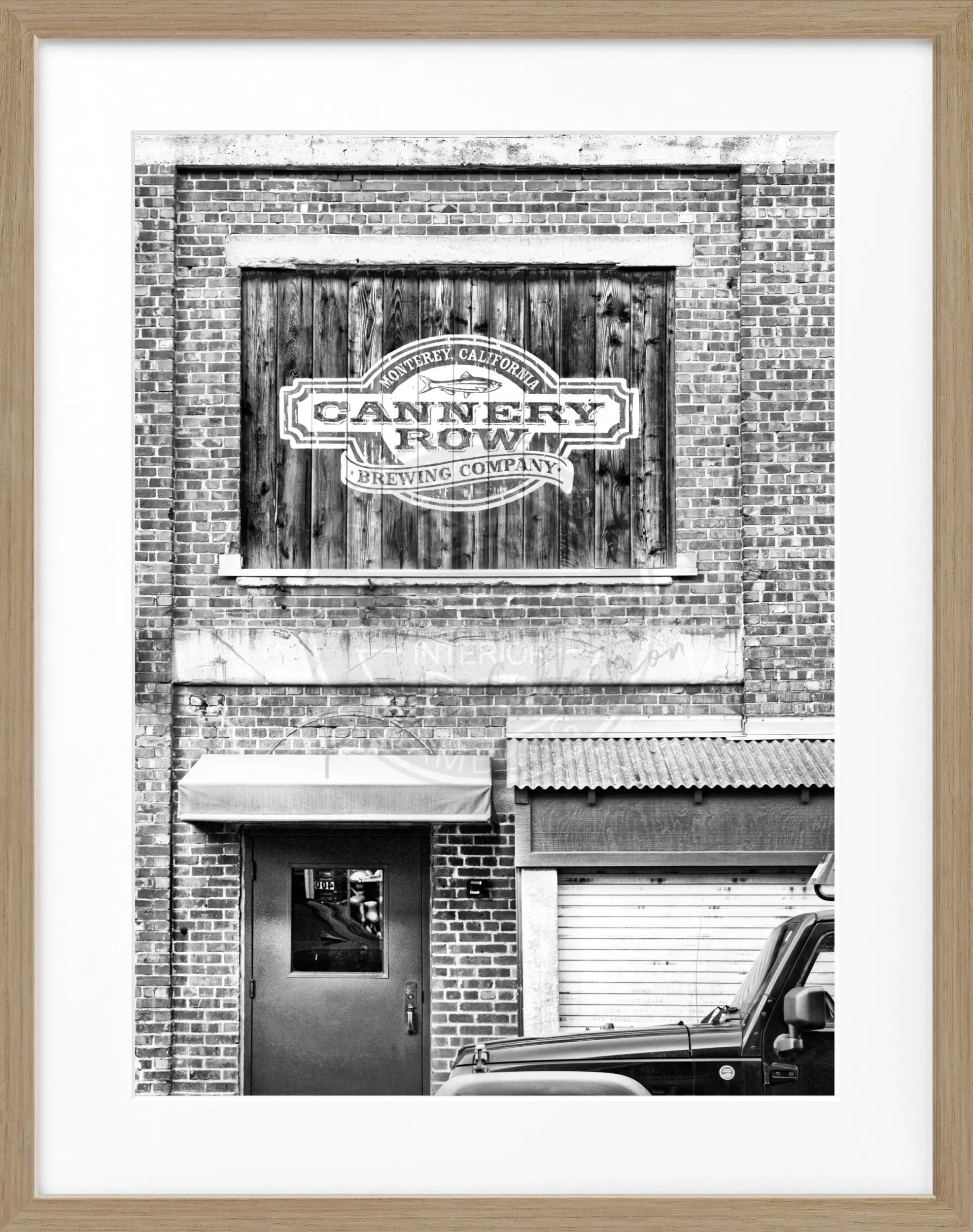 Schwarz-weiß Poster mit Rahmen von Cosman-Photocollection, Kalifornien Cannery Row in Monterey, 25x31cm, Kunstfotografie