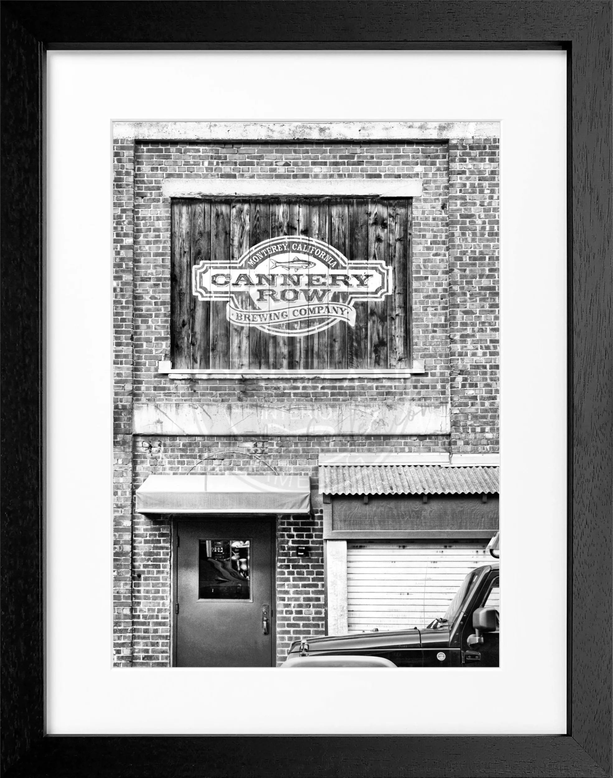 Schwarz-weiß Poster mit Rahmen von Cosman-Photocollection, Kalifornien ’Cannery Row’ in Monterey, 25x31cm, dekoratives Wandbild