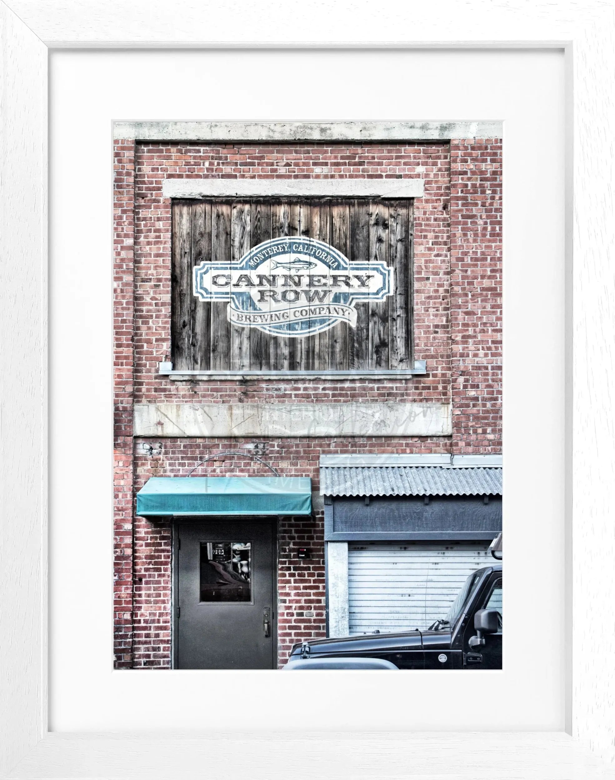 Schwarz-weiß Poster mit Rahmen von Cosman-Photocollection, Kalifornien ‚Cannery Row‘ in Monterey, Bildgröße 25x31 cm.