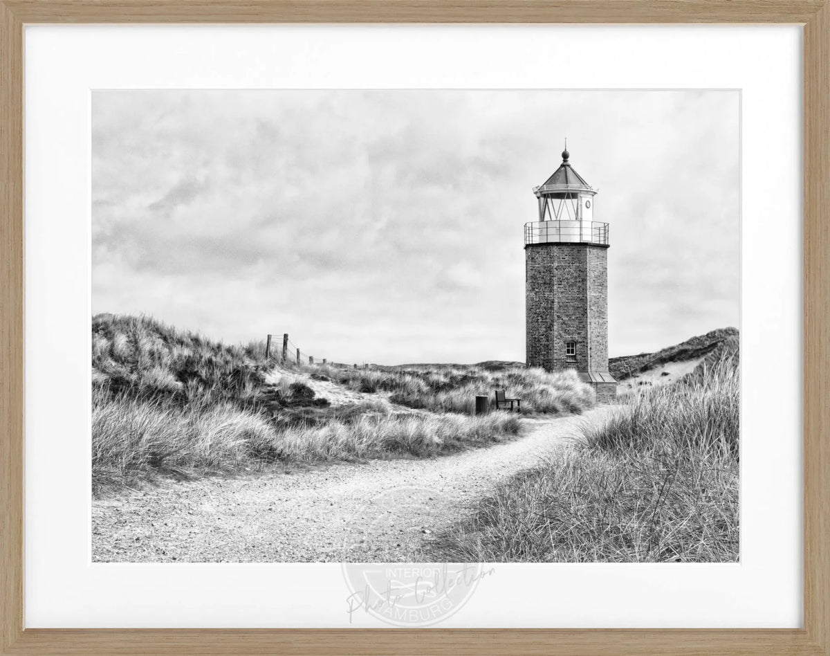 Schwarz-weiß Poster mit Rahmen, zeigt den Leuchtturm am Roten Kliff auf Sylt, von Cosman-Photocollection, 31x25 cm